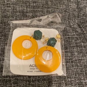 Clip on yellow and green earrings
